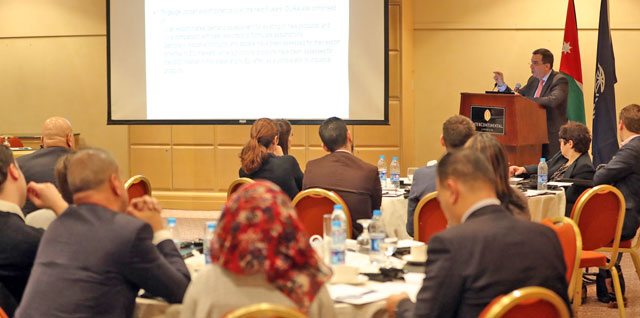 Minister of Planning and International Cooperation Imad Fakhoury attends the launch of the World Bank's periodic report Jordan Economic Monitor, Fall 2017, on Wednesday (Photo courtesy of Planning Ministry)