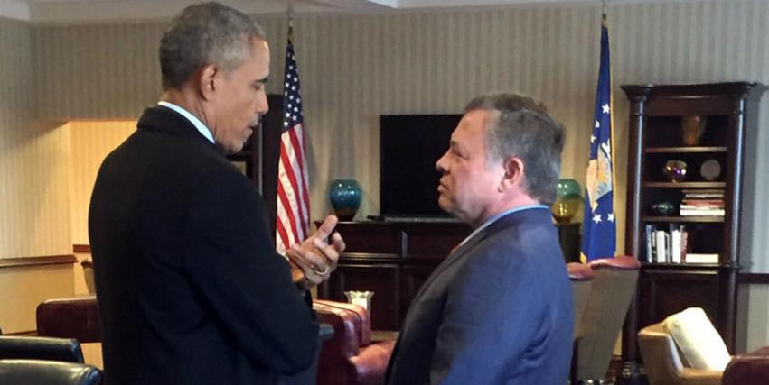 His Majesty King Abdullah speaks to US President Barack Obama at the Andrews Air Force Base in Washington on Wednesday (Photo courtesy of Royal Court)