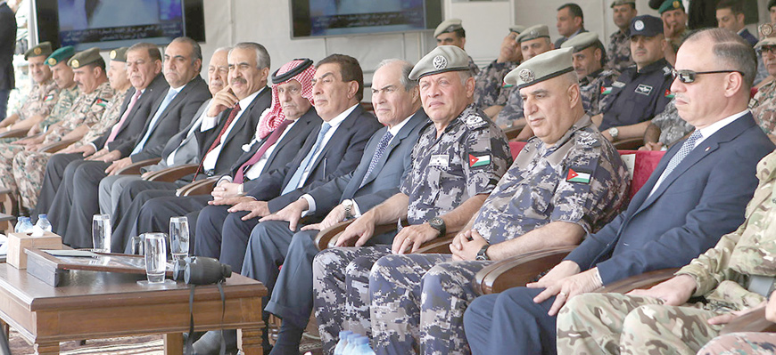 His Majesty King Abdullah attends a drill by Civil Defence Department’s cadres in Amman on Monday (Photo courtesy of Royal Court)