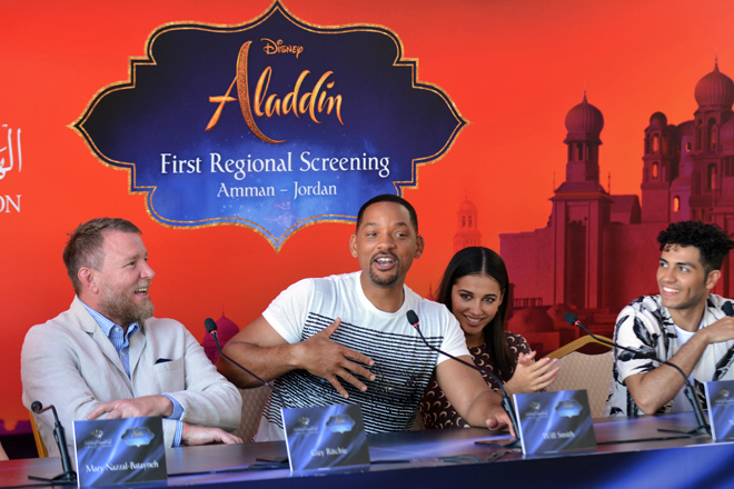 Left to right: 'Aladdin' director Guy Richie and cast Will Smith, Naomi Scott and Mena Massoud speak during a press conference in Amman, ahead of the commercial release of the film in Jordan, where parts of the picture were shot (Photo by Amjad Ghsoun)