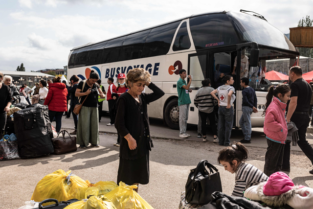 Armenian refugees from Nagorno Karabakh are seen in the centre of the town of Goris on Saturday before being evacuated in various Armenian cities  (AFP photo)