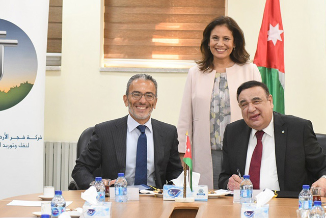 Energy Minister Hala Zawati and representatives of the National Electric Power Company and the Jordanian-Egyptian FAJR for Natural Gas Transmission and Supply Company are seen during a signing ceremony on Tuesday (Petra photo)