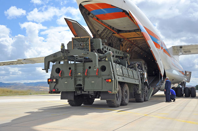   This handout photo taken and released on Friday by the Turkish defence ministry shows a Russian military cargo plane carrying S-400 missile defence system from Russia to the Murted military airbase (also known as Akincilar millitary airbase), in Ankara (AFP photo)