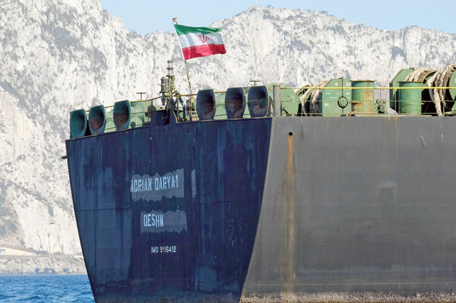 An Iranian flag flutters on board the Adrian Darya oil tanker, formerly known as Grace 1, off the coast of Gibraltar, on Sunday (AFP photo)