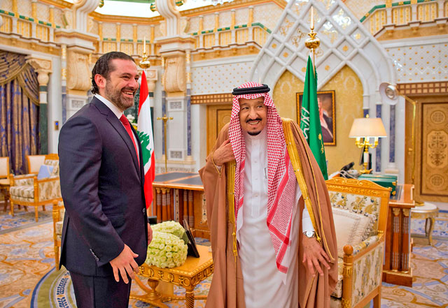 This handout photo provided by the Saudi Royal Palace on Wednesday shows King Salman (right) receiving Lebanese Prime Minister Saad Hariri at the royal palace in the Saudi capital Riyadh (AFP photo)