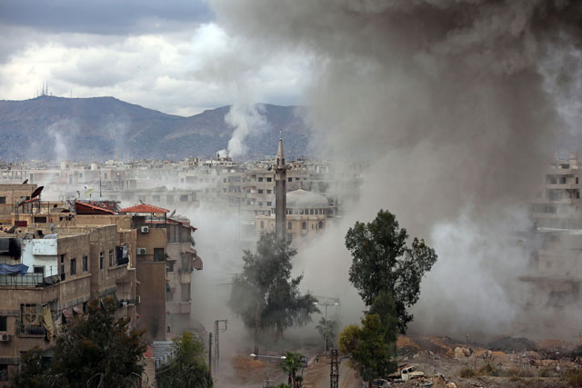 Smoke billows following Syrian government bombardments on Kafr Batna, in the besieged Eastern Ghouta region on the outskirts of the capital Damascus on Thursday (AFP photo)