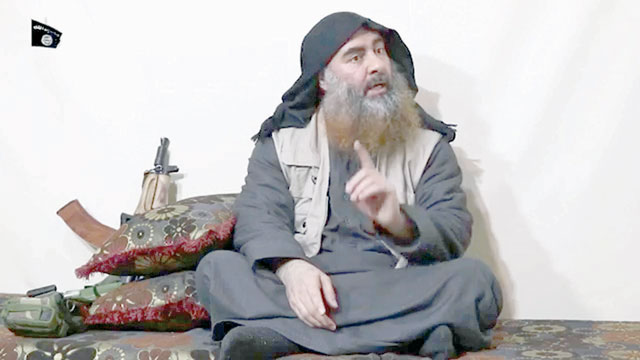In this undated and unlocated TV grab, taken from a video released by Al Furqan media, the chief of the Daesh group Abu Bakr Al Baghdadi appears for the first time in five years in a propaganda video (AFP photo)
