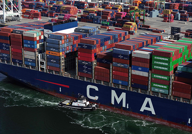 In an aerial view, container ship CMA CGM Osiris is escorted into the Port of Oakland on April 09, 2025 in Oakland, California (AFP photo)