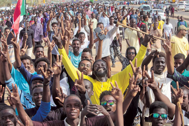 Sudanese protesters take part in a demonstration called for by the Sudanese Professionals Association to denounce the July 29 Al Obeid killings, in the capital Khartoum, on Thursday (AFP photo)