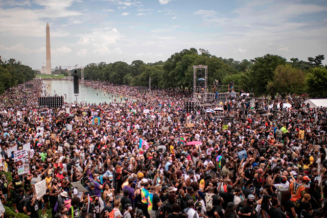 People attend the 'Commitment March: Get Your Knee Off Our Necks' protest against racism and police brutality on Friday, at the Lincoln Memorial in Washington, DC (AFP photo)