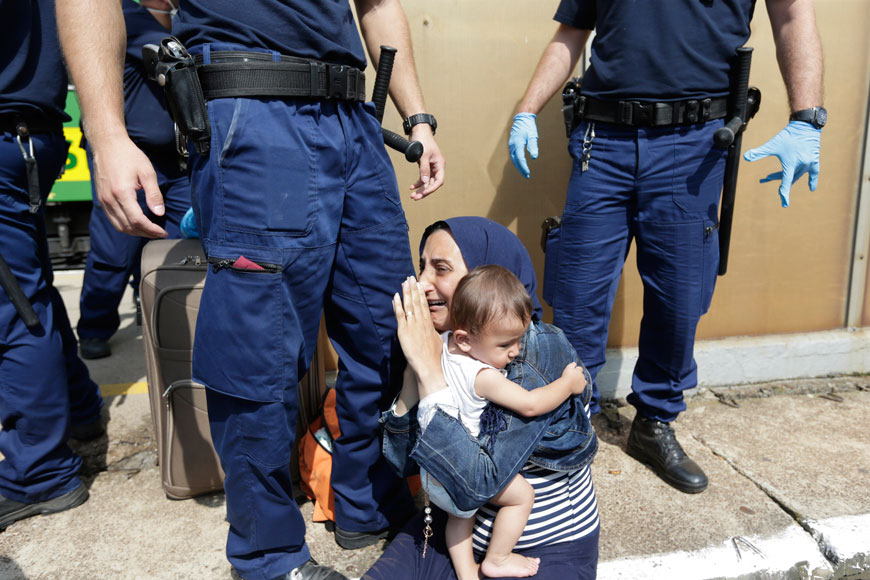 A migrant is detained  in Bicske, Hungary, on Thursday (AP photo)