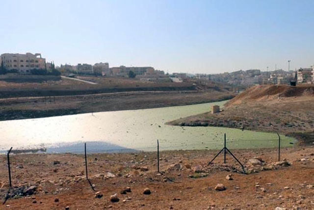 Prime Minister Omar Razzaz says on Monday that the environmental problems caused by the cesspit, known as the ‘Pepsi Pool’ in the Ruseifa area, need a sustainable engineering and environmental solution (Photo courtesy of Al Rai)