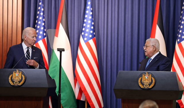 This handout photo provided by the Palestinian Authority's press office shows US President Joe Biden and Palestinian President Mahmoud Abbas delivering their statements to the media at the Muqataa Presidential Compound in the city of Bethlehem in the occupied West Bank on Friday (AFP photo)