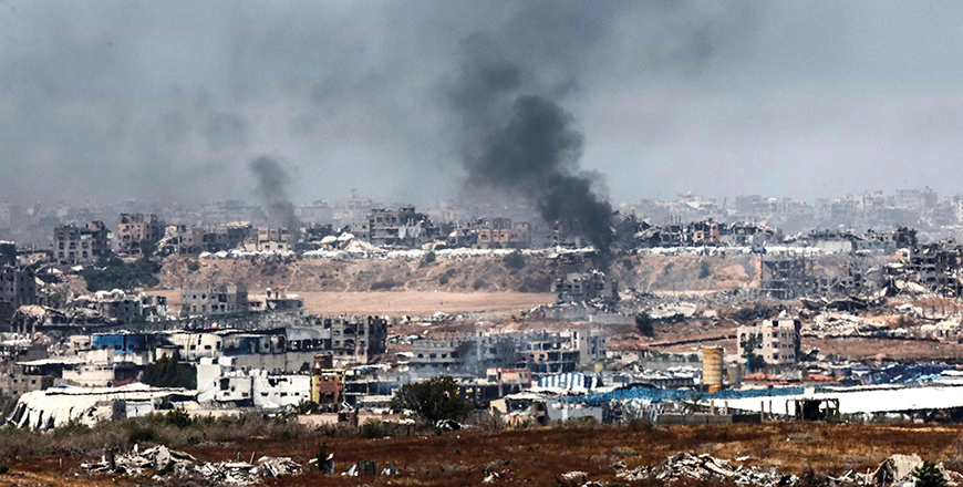 This picture taken from a position in southern Israel on the border with the Gaza Strip shows smoke billowing over destroyed buildings on the Gaza Strip during Israeli bombardment on May 17, 2025 (AFP photo)