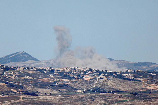 This photo taken from Israel along the border with southern Lebanon shows smoke billowing near the Lebanese village of Khiam during Israeli bombardment on Tuesday (AFP photo)