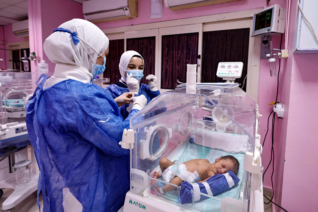 Egyptian medics provide care to premature Palestinian babies, recently evacuated from the Gaza Strip, at a hospital in Al Aris in the North Sinai governorate of Egypt on Wednesday (AFP photo)