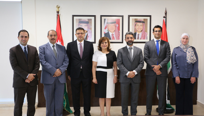   Social Security Investment Fund (SSIF) CEO Kholoud Saqqaf (centre) poses for a photo with Meridiam Jordan’s General Manager Jad Hreibe (third from left) and representatives from the SSIF and Meridiam Jordan (Photo courtesy of SSIF)