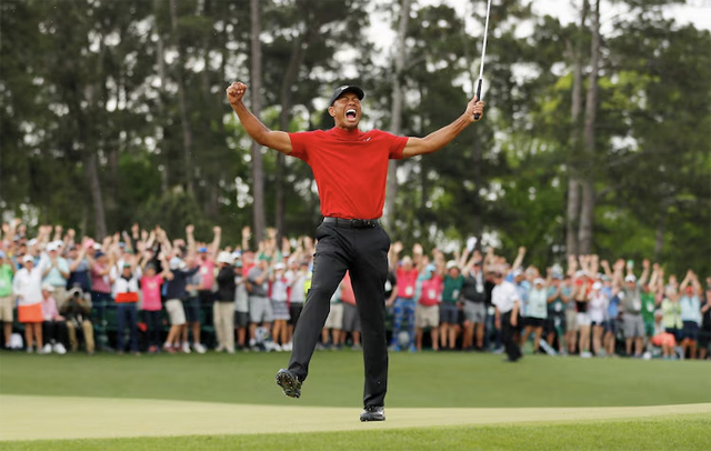 Tiger Woods of the United States celebrates after sinking his putt on the 18th green to win during the final round of the Masters at Augusta National Golf Club, April 14, 2019, in Augusta (AFP photo)