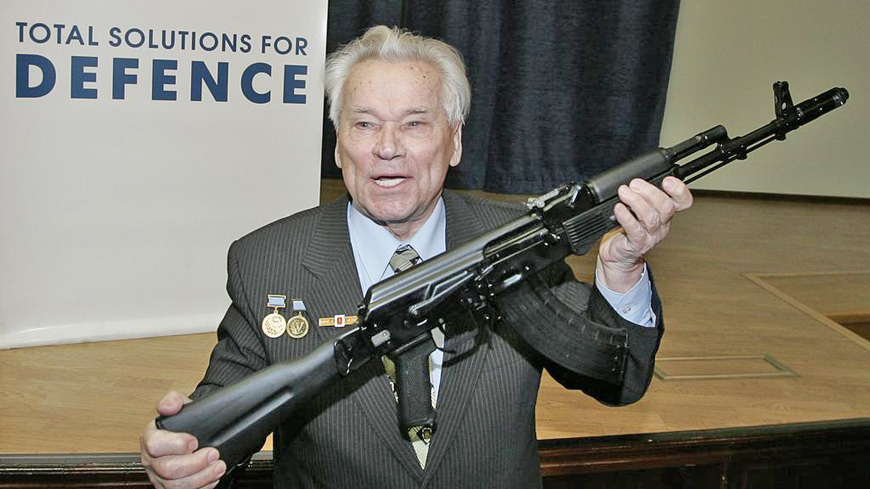 Mikhail Kalashnikov, the Russian inventor of the AK-47 assault rifle, holds an AK-103 while he poses for a picture in Moscow in 2006 (AFP photo)