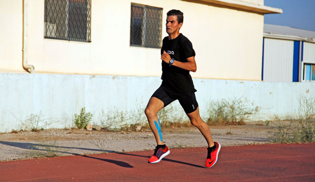In this June 25 photo, Moath Khawaldeh does long-distance running training at the Sports City racetrack in Amman  (AP photo by Sam McNeil)