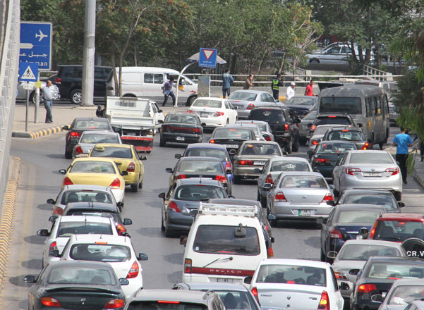 Traffic in Amman on Wednesday. Awareness and better law enforcement are likely to help ease congestions in the capital, experts say (Photo by Hassan Tamimi)