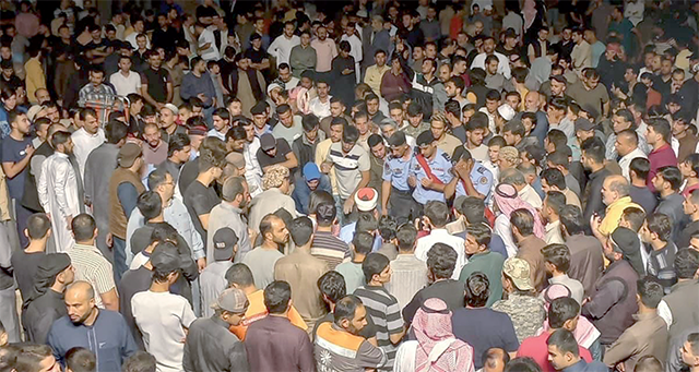 People attend the funeral of Hamzeh Al Fanatseh, who was killed by a stray bullet on his wedding day, in Maan on Wednesday (Photo courtesy of PSD Facebook page)