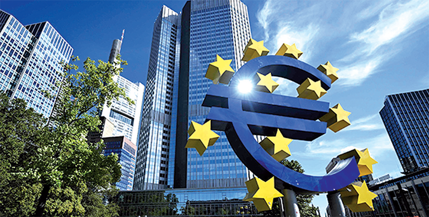 People walk past the Euro currency sign in front of the former European Central Bank building on September 14, 2023 (AFP file photo)
