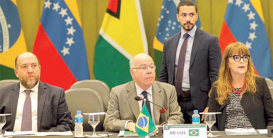 Brazil’s Foreign Minister Mauro Vieira (centre) meets with Guyana’s Foreign Minister Hugh Todd (out of frame) and Venezuela’s Foreign Minister Yvan Gil (out of frame) to discuss the crisis about the territory of Essequibo which has long pitted their two countries, at the Itamaraty Palace in Brasilia, Brazil, on Thursday (AFP photo)