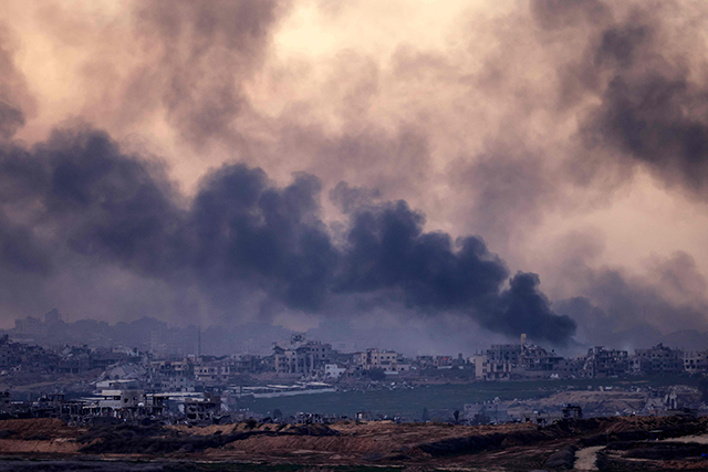 A picture taken from the southern city of Sterod shows smoke rising above destroyed buildings in the northern Gaza Strip during an Israeli army bombardment on January 5, 2025 (AFP photo)