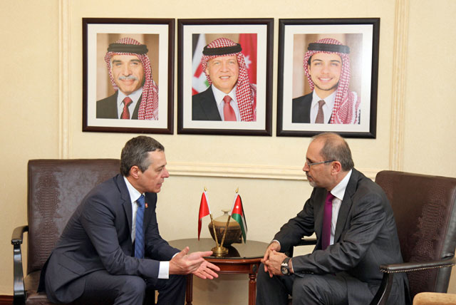 Foreign Minister Ayman Safadi meets with Swiss counterpart Ignazio Cassis on Monday in Amman (Petra photo)
