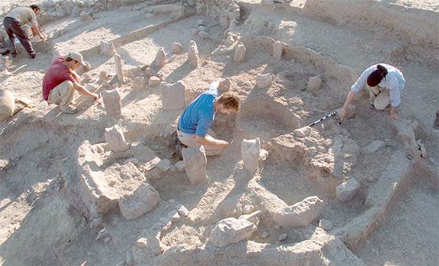 The outer walls of the structure, which was constructed 11,300 –11,200 BC, are defined by a partially preserved mud wall (Photo courtesy of Bill Finlayson)