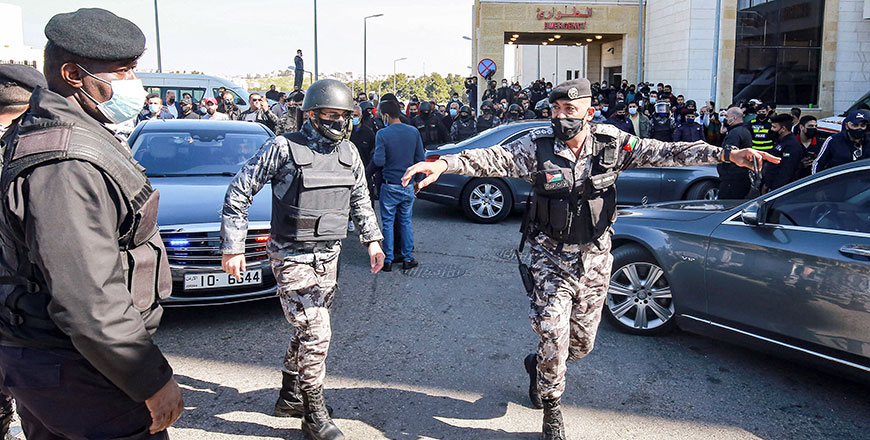 Members of gendarmerie stand guard outside the New Salt Hospital in the town of Salt, northwest of Amman, on Saturday (AFP photo)