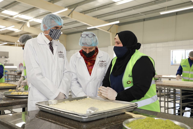 Luc Le Cabellec, the French Development Agency Country Director for Jordan and Iraq, and Catherine Bonnaud, the AFD regional director for the Middle East, visit the Anabtawi factory (Photo courtesy of BDC)