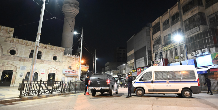 Police officers are seen manning a street in downtown Amman in this recent photo (Photo by Amjad Ghsoun)