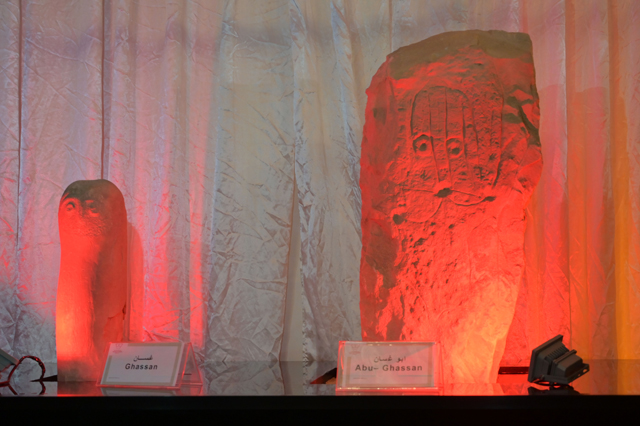 Two stones shaped in human forms named Abu Ghassan and Ghassan are displayed during a press conference at the Department of Antiquities in Amman on Tuesday (Photo by Amjad Ghsoun)