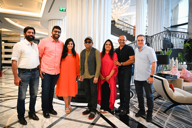 Oscar-winning Indian music composer A.R. Rahman poses for a group photo upon arrival in Amman on Monday (Photo by Amjad Ghsoun)