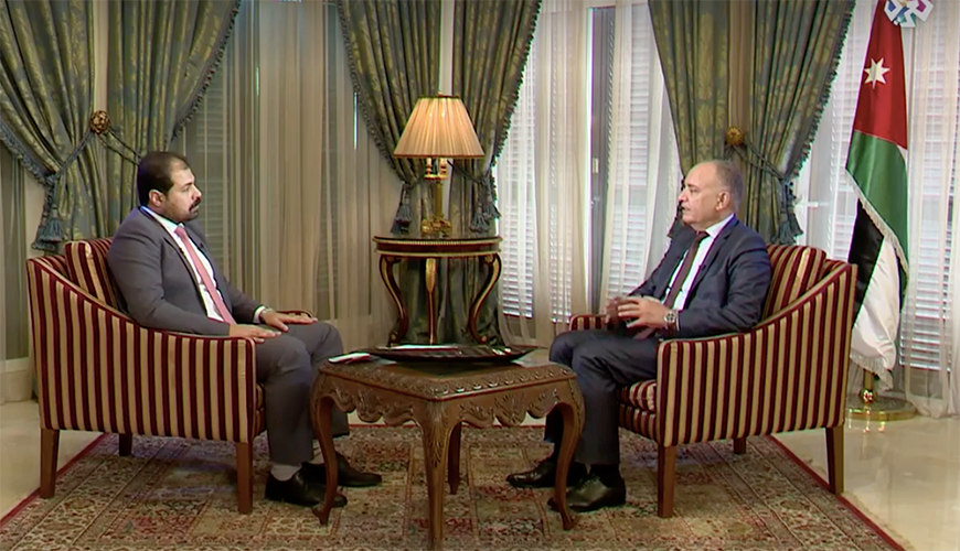 Minister of State for Media Affairs Amjad Adaileh speaks during an interview on the 'Special Talk' programme, aired on Al Araby Television on Friday (Photo courtesy of Al Araby Facebook page)