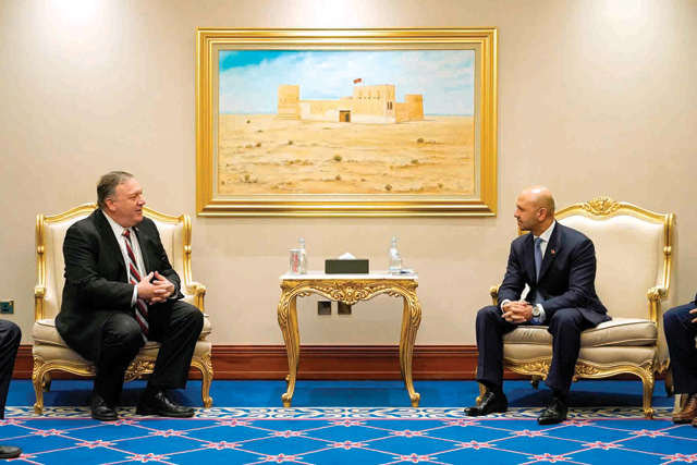 US Secretary of State Mike Pompeo (left) meets with Afghanistan’s State Minister for Peace Sayed Sadat Mansoor Naderi and negotiators in the Qatari capital Doha on Saturday (AFP photo)