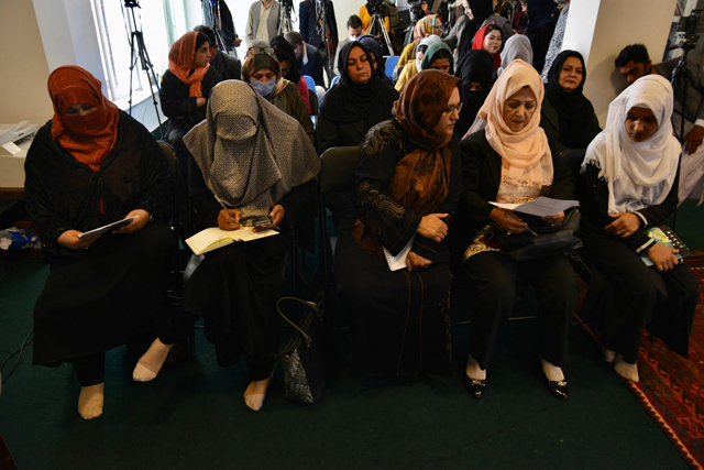 A group of Afghan women activists attend a press conference in Kabul on Sunday, to demand reopening of secondary schools for girls across the country (AFP photo)