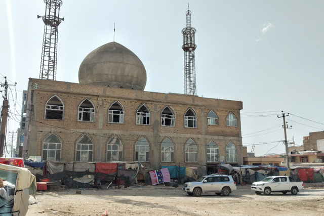 The general view of a Shiite Mosque is photographed after a bomb blast that reportedly killed 14 people in Mazar-e-Sharif on Thursday (AFP photo)