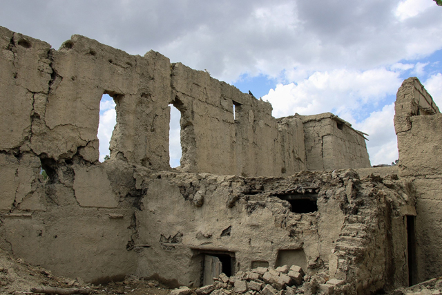 Ruins of houses damaged after an earthquake is photographed in Gayan district, Paktika province, on Friday (AFP photo)