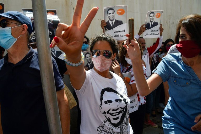 Algeria's Hirak protests have been stalled due to coronavirus restrictions, but demonstrators gathered to demand the release of journalist Khaled Drareni who has jailed for covering the Hirak marches (AFP photo)
