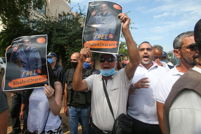Algerian protesters gather outside the court in the capital Algiers on Tuesday, in support of journalist Khaled Drareni during his appeal (AFP photo)