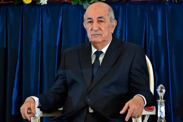 In this file photo taken on December 19, 2019 Algerian President-elect Abdelmadjid Tebboune sits during the formal swearing-in ceremony in the capital Algiers (AFP photo)
