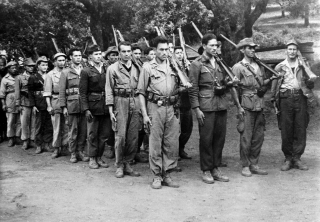In this file photo taken in 1957, Algerian fighters from ALN (National Liberation Army), armed wing of the nationalist National Liberation Front of Algeria, take part in a military exercise  (AFP photo)