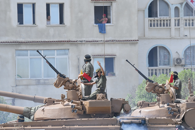 Algerian soldiers take part in a parade in the capital Algiers on Wednesday, as the country celebrates the 60th anniversary of its independence (AFP photo)