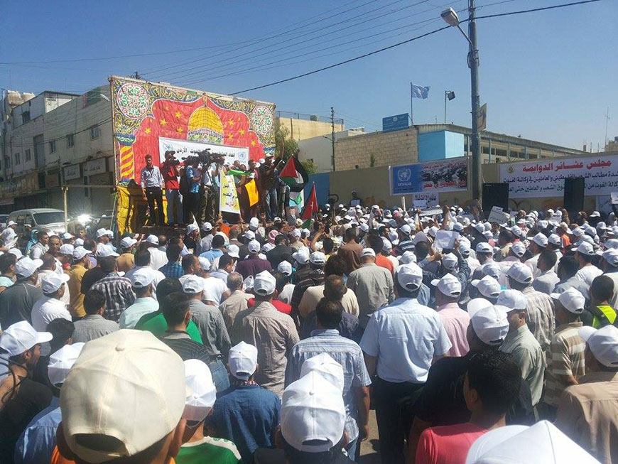 UNRWA workers and supporters rally in Wihdat, Amman, against expected cuts in the agency’s services (JT photo)