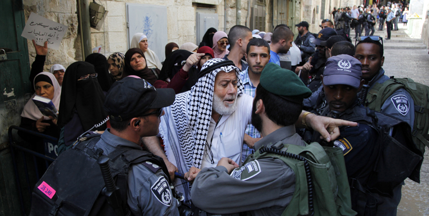 A Palestinian man argues with an Israeli soldier during a protest in Jerusalem’s Old City on Thursday (AP photo by Mahmoud Illean)