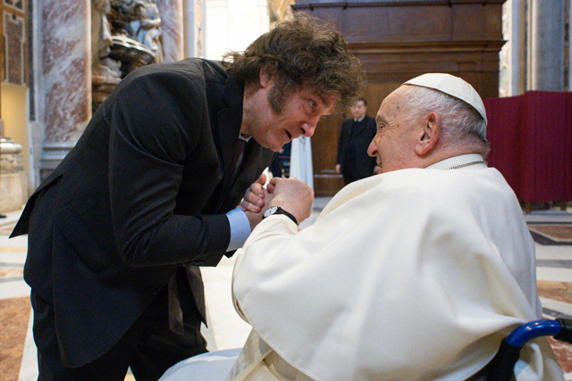 This handout photograph taken on Sunday and released by the Vatican press office, Vatican Media, shows Pope Francis (right) greeting Argentine President Javier Milei  at the Vatican (AFP photo)