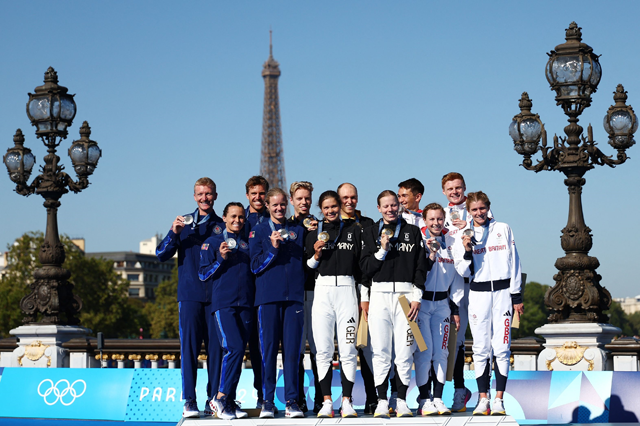 From left to right: US' silver medallists Seth Rider, Taylor Spivey, Morgan Pearson and Taylor Knibb, Germany's gold medallists Tim Hellwig, Lisa Tertsch, Lasse Luehrs and Laura Lindemann, and Great Britain's bronze medallists Alex Yee, Georgia Taylor-Brown, Samuel Dickinson and Beth Potter at the Paris 2024 Olympic Games on Monday (AFP photo)